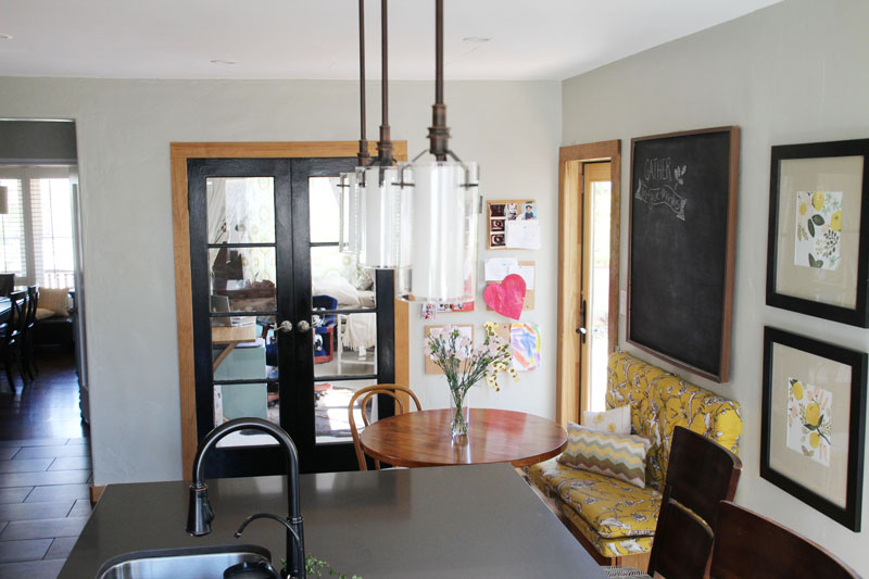 Kitchen Breakfast Table | Tufted Bench, Giant Chalkboard, Black French Doors | PepperDesignBlog.com