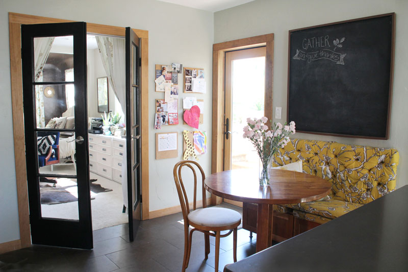 Kitchen Breakfast Table | Tufted Bench, Giant Chalkboard, Black French Doors | PepperDesignBlog.com