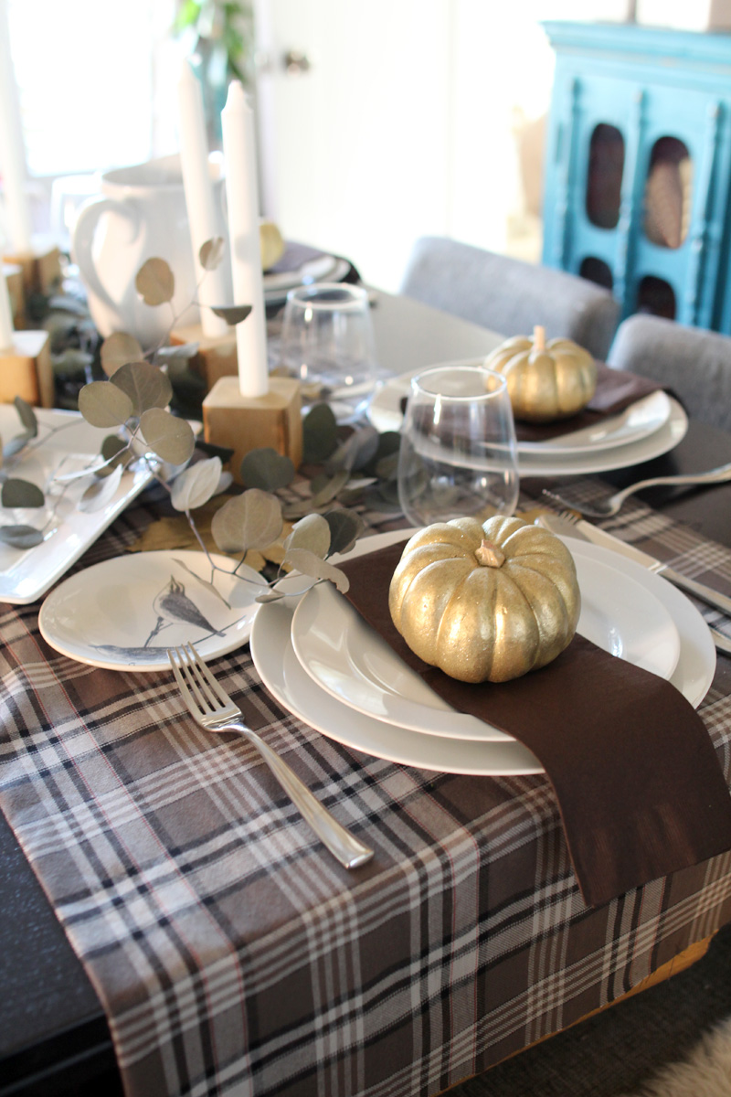 Plaid Thanksgiving Table | Wooden Bedpost Candlesticks, Glitter Gold Pumpkins, Brown, Black, Tan Plaid Tablescape | PepperDesignBlog.com
