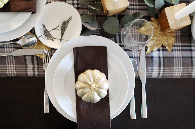 Plaid Thanksgiving Table | Wooden Bedpost Candlesticks, Glitter Gold Pumpkins, Brown, Black, Tan Plaid Tablescape | PepperDesignBlog.com