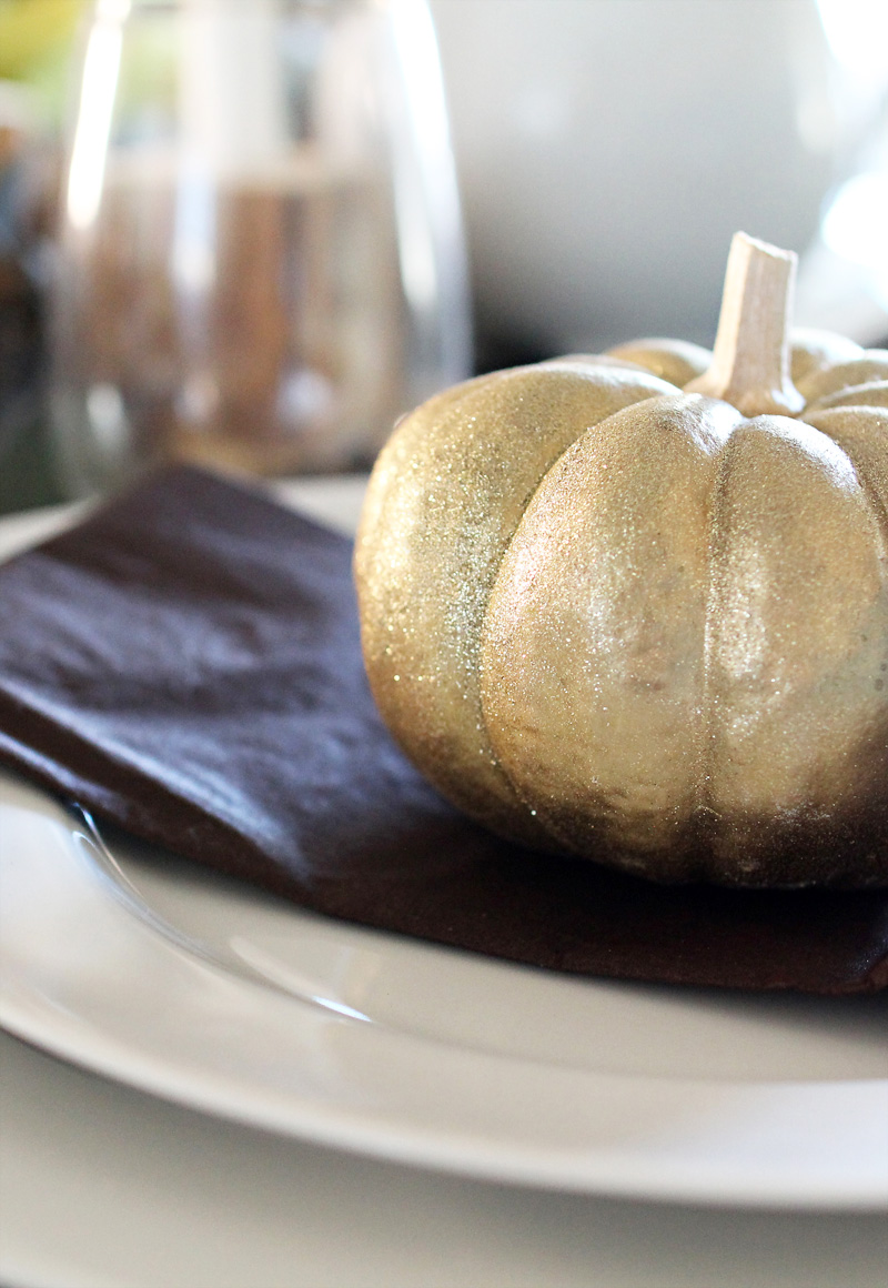 Plaid Thanksgiving Table | Wooden Bedpost Candlesticks, Glitter Gold Pumpkins, Brown, Black, Tan Plaid Tablescape | PepperDesignBlog.com