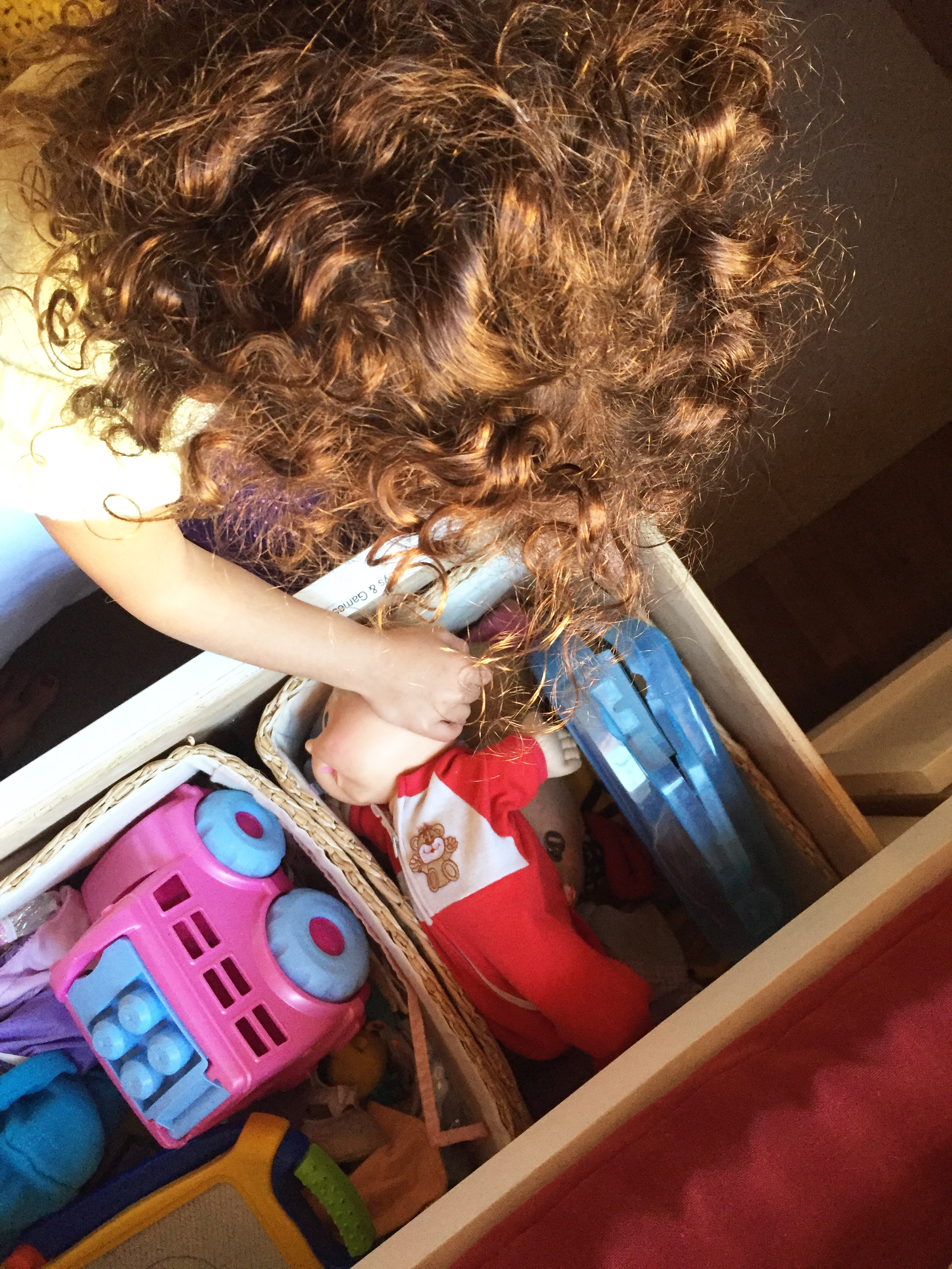 Glad to Give - Liv Sorting Toys in Girls' Room